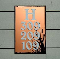 Screen printed acrylic backer for directional signs at Condominium complex in Sea-Tac, WA